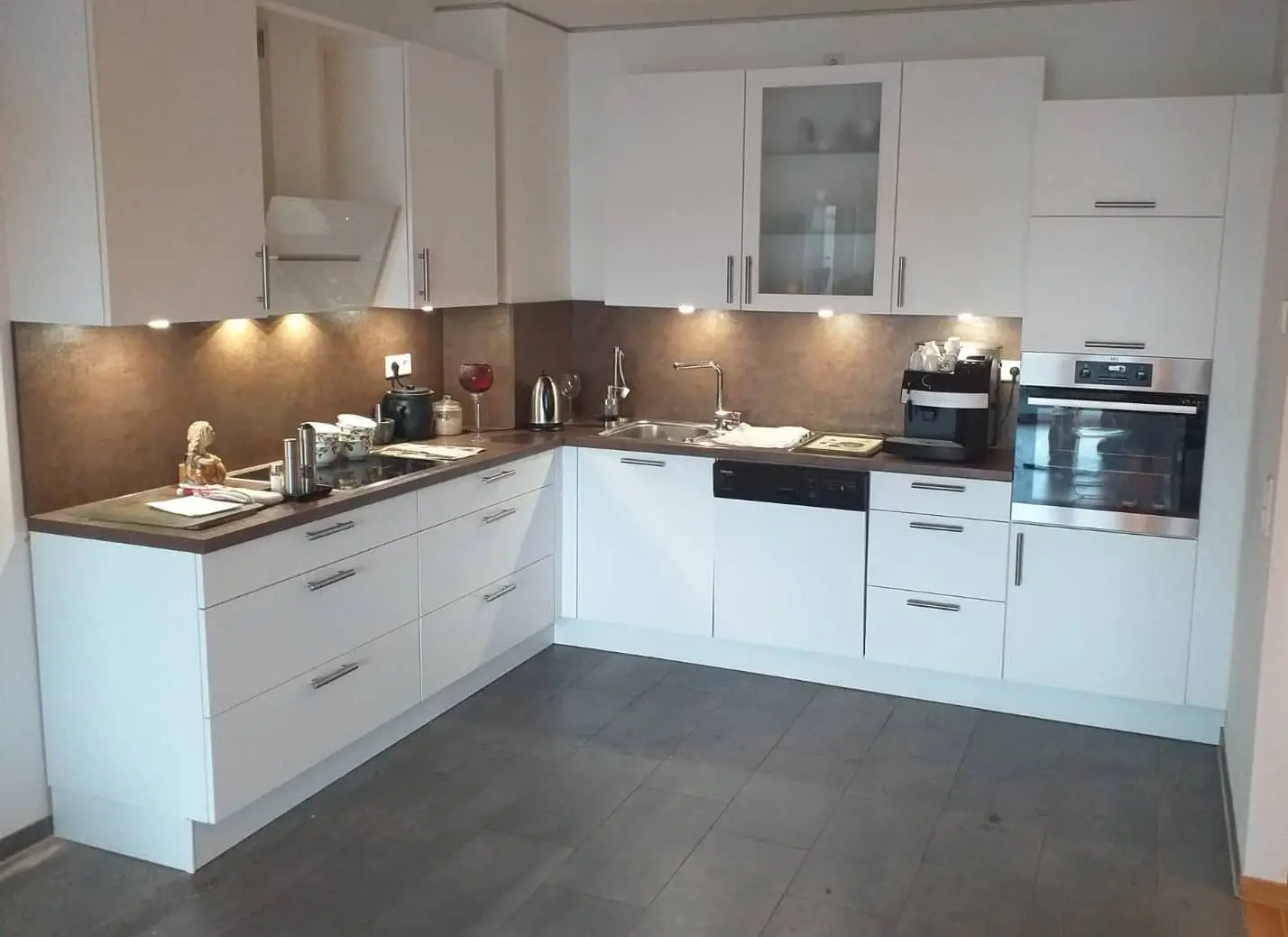 fitted kitchen with back panel